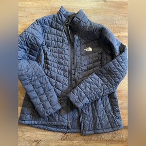 North Face blue light puffer jacket